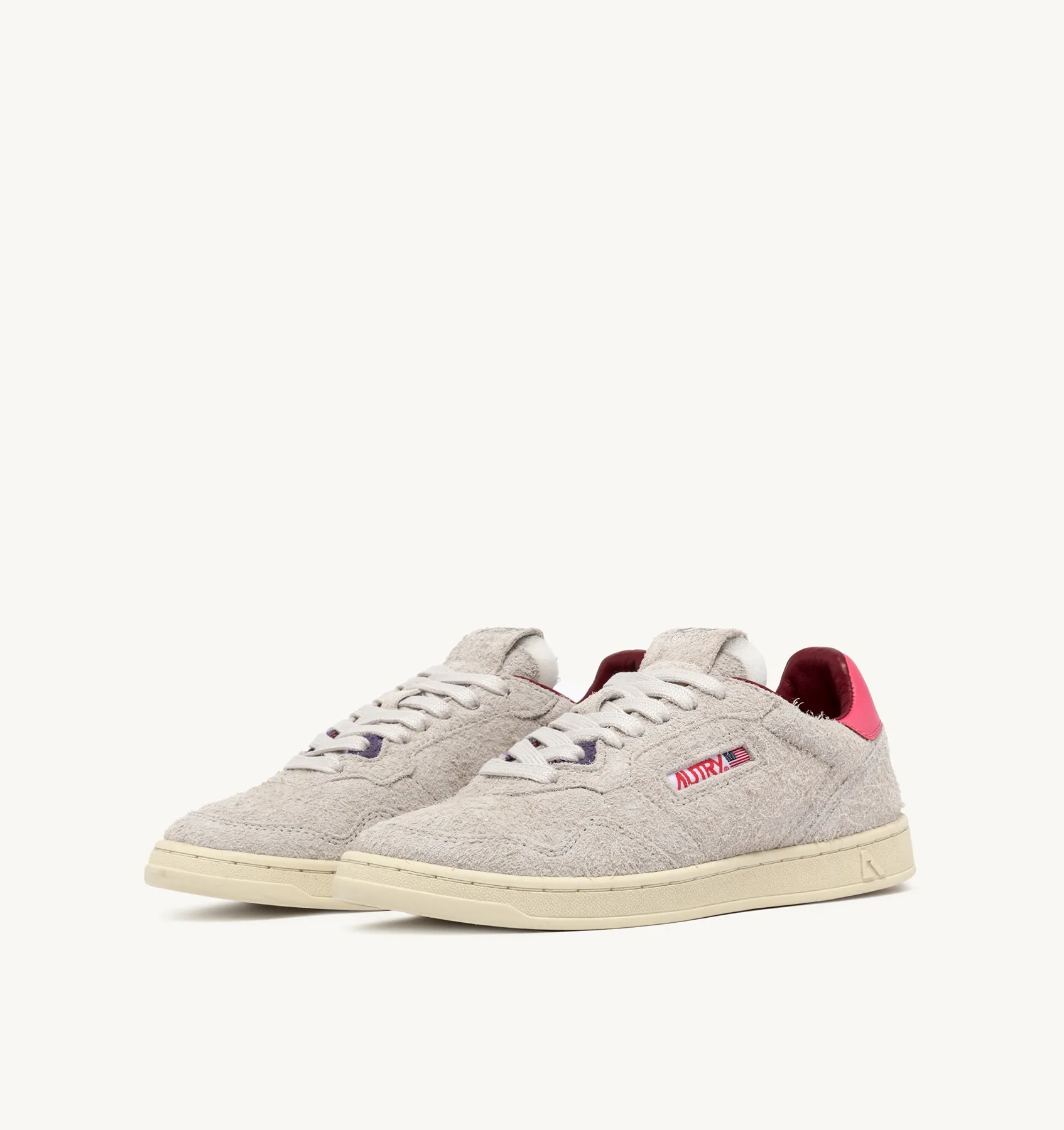 AUTRY NEW ARRIVALS WOMAN WOMAN  NEW FLAT LOW SNEAKERS IN WHITE AND CALYPSO CORAL SUEDE